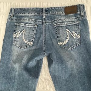 Maurices stone wash denim boot cut mid rise jeans. Size 7/8 long